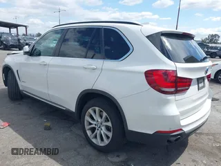 2016 BMW X5 sDrive35i with VIN 5UXKR2C55G0H43136, listed as a IAAI auction lot 41835931 with 125,751 mi miles. Bid and sale history available at carsss.com. Image 3.