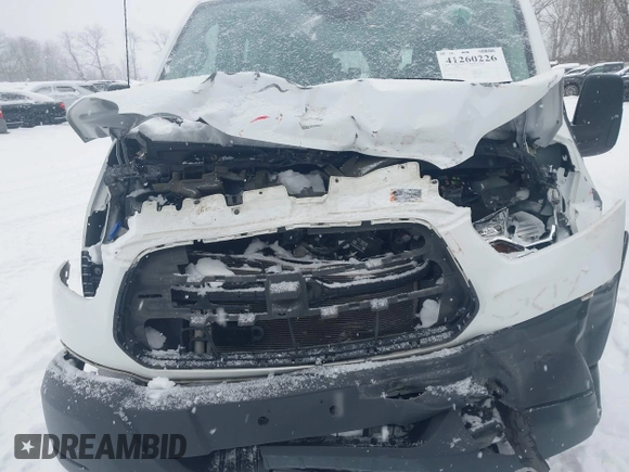 2019 Ford Transit Passenger XL z VIN 1FBZX2ZM4KKB53934, wystawiony jako IAAI lot #41260226 z przebiegiem 153 409 mil mil oraz . Historia ofert i sprzedaży dostępna na DreamBid. Obrazek 6.