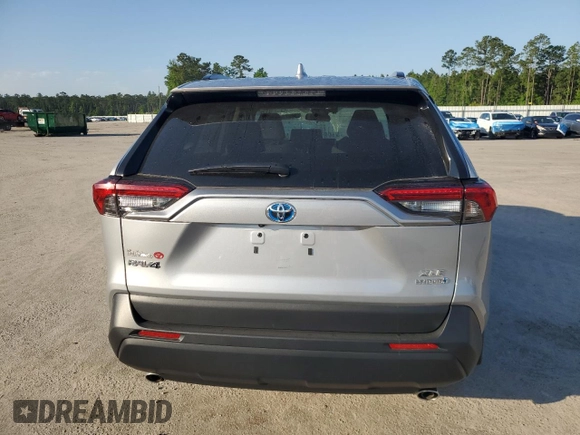 2024 Toyota RAV4 Hybrid XLE Premium z VIN 2T3B6RFV0RW074218, wystawiony jako Copart lot #56917295 z przebiegiem 14 969 mil mil oraz Szkoda całkowita • Salvage title. Historia ofert i sprzedaży dostępna na DreamBid. Obrazek 6.