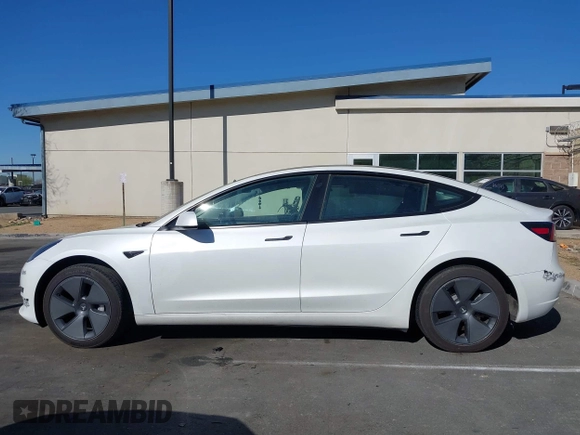 2023 Tesla Model 3 with VIN 5YJ3E1EA6PF411940, listed as a IAAI auction lot 41829537 with 32,877 mi miles and . Bid and sale history available at carsss.com. Image 13.