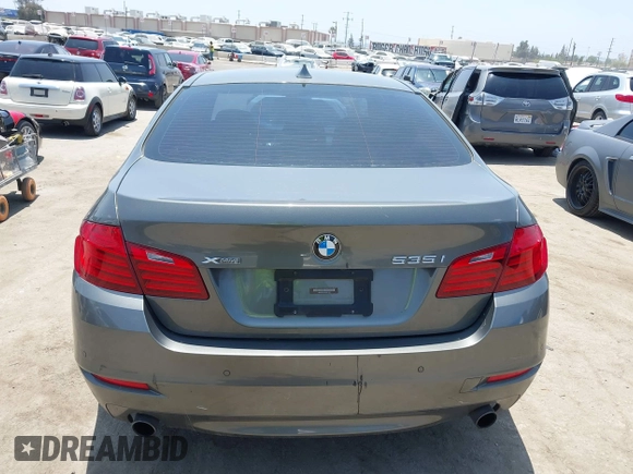 2014 BMW 5 Series 535i xDrive with VIN WBA5B3C57ED531072, listed as a IAAI auction lot 42574991 with 104,304 mi miles and . Bid and sale history available at DreamBid. Image 17.
