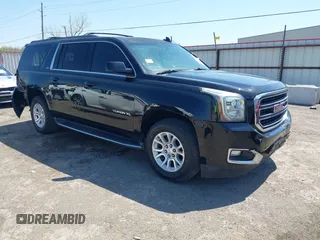 2015 GMC Yukon XL SLT z VIN 1GKS2HKC0FR513119, wystawiony jako IAAI lot #41974063 z przebiegiem 160 093 mil mil oraz . Historia ofert i sprzedaży dostępna na DreamBid. Obrazek 1.