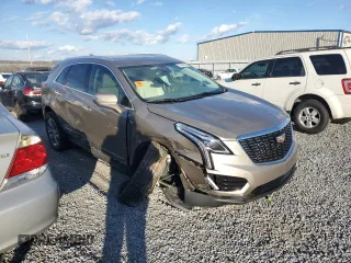 2023 Cadillac XT5 FWD Premium Luxury with VIN 1GYKNCRS6PZ108977, listed as a Copart auction lot 87249294 with 0 mi miles and Salvage Title. Bid and sale history available at carsss.com. Image 4.