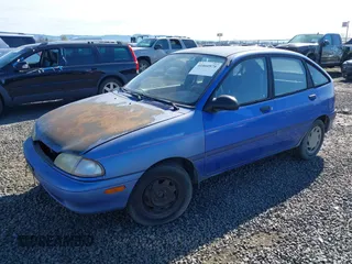 1995 Ford Aspire z VIN KNJLT06H7S6105536, wystawiony jako IAAI lot #41860978 z przebiegiem 66 132 mil mil oraz . Historia ofert i sprzedaży dostępna na DreamBid. Obrazek 2.