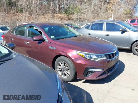 2020 Kia Optima LX with VIN 5XXGT4L38LG393235, listed as a IAAI auction lot 41676769 with 133,312 mi miles and . Bid and sale history available at carsss.com. Image 1.