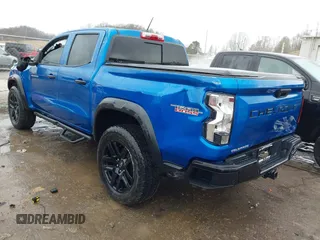 2023 Chevrolet Colorado 4WD Trail Boss with VIN 1GCPTEEK3P1208942, listed as a IAAI auction lot 41475026 with 11,576 mi miles. Bid and sale history available at carsss.com. Image 3.