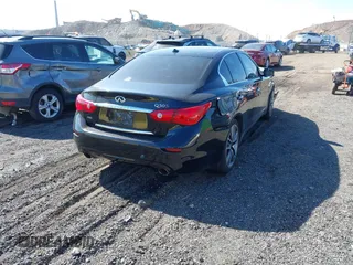 2014 Infiniti Q50 Premium with VIN JN1BV7AR0EM689783, listed as a IAAI auction lot 41661020 with 124,762 mi miles. Bid and sale history available at carsss.com. Image 4.