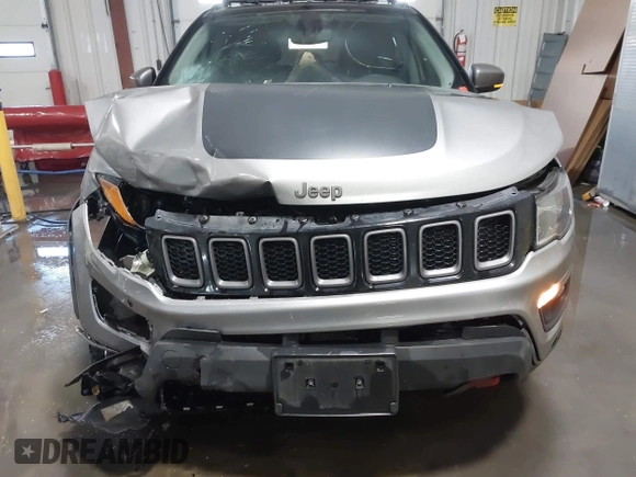 2019 Jeep Compass Trailhawk with VIN 3C4NJDDB9KT765459, listed as a IAAI auction lot 41319891 with 83,860 mi miles and . Bid and sale history available at carsss.com. Image 6.