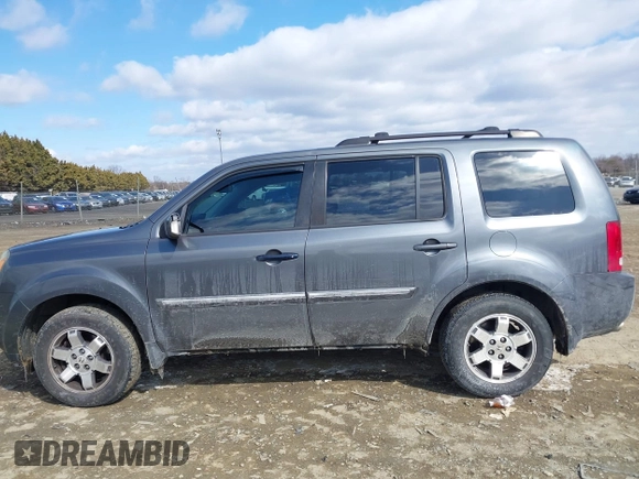 2011 Honda Pilot Touring with VIN 5FNYF4H98BB016012, listed as a IAAI auction lot 41634844 with 202,160 mi miles. Bid and sale history available at carsss.com. Image 14.