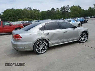 2014 Volkswagen Passat SEL Premium z VIN 1VWCN7A35EC073576, wystawiony jako Copart lot #52810825 z przebiegiem 113 067 mil mil oraz Szkoda całkowita • Salvage title. Historia ofert i sprzedaży dostępna na DreamBid. Obrazek 3.