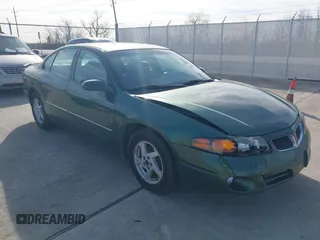 2003 Pontiac Bonneville SE z VIN 1G2HX52K534141741, wystawiony jako IAAI lot #41481963 z przebiegiem 124 140 mil mil oraz . Historia ofert i sprzedaży dostępna na DreamBid. Obrazek 1.
