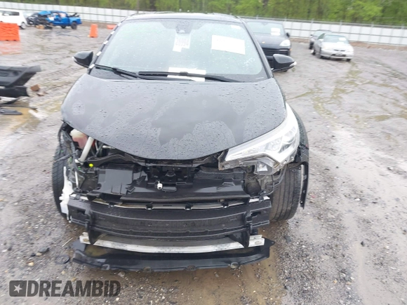 2018 Toyota C-HR XLE with VIN NMTKHMBX4JR032773, listed as a IAAI auction lot 41957588 with 100,691 mi miles. Bid and sale history available at carsss.com. Image 13.