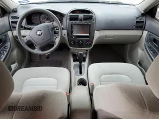2006 Kia Spectra EX with VIN KNAFE121X65333208, listed as a Copart auction lot 70634994 with 145,288 mi miles and Salvage Title. Bid and sale history available at carsss.com. Image 8.
