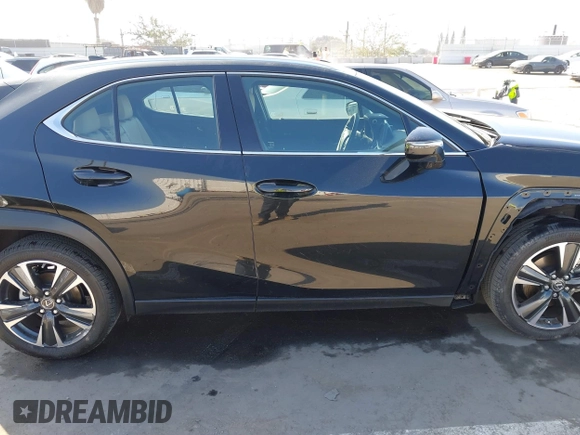2024 Lexus UX with VIN JTHX6JBH7R2162231, listed as a IAAI auction lot 41665179 with 21,913 mi miles. Bid and sale history available at carsss.com. Image 14.