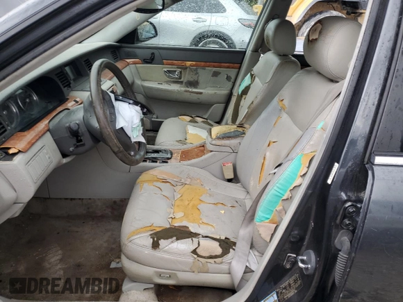 2005 Kia Amanti z VIN KNALD124055070757, wystawiony jako Copart lot #50641415 z przebiegiem 135 548 mil mil oraz Szkoda całkowita • Salvage title. Historia ofert i sprzedaży dostępna na DreamBid. Obrazek 7.