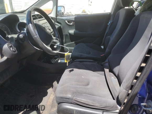 2010 Honda Fit Sport with VIN JHMGE8H43AC013684, listed as a Copart auction lot 59904895 with 144,481 mi miles and Clean title. Bid and sale history available at DreamBid. Image 7.