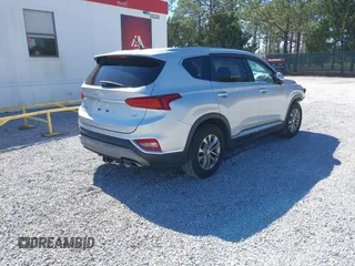 2019 Hyundai Santa Fe SE with VIN 5NMS2CAD4KH109117, listed as a IAAI auction lot 41591901 with 133,338 mi miles. Bid and sale history available at carsss.com. Image 4.