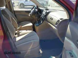 2008 Kia Sedona LX with VIN KNDMB233586245771, listed as a IAAI auction lot 41779801 with 141,157 mi miles. Bid and sale history available at carsss.com. Image 5.