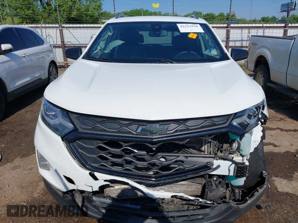 2021 Chevrolet Equinox Premier z VIN 2GNAXNEV9M6120241, wystawiony jako IAAI lot #42222928 z przebiegiem 104 274 mil mil oraz . Historia ofert i sprzedaży dostępna na DreamBid. Obrazek 13.
