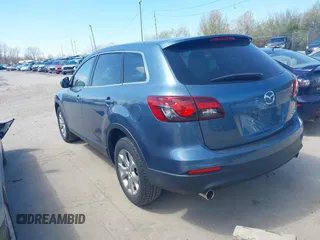 2015 Mazda CX-9 Sport with VIN JM3TB2BV7F0458193, listed as a IAAI auction lot 41886385 with 154,677 mi miles and . Bid and sale history available at carsss.com. Image 3.