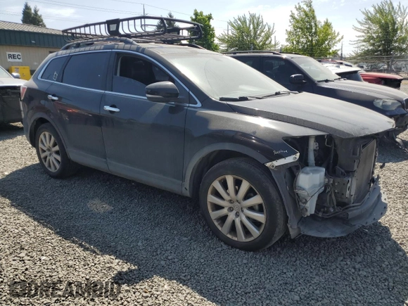 2010 Mazda CX-9 Grand Touring with VIN JM3TB3MV8A0235690, listed as a Copart auction lot 60153975 with 146,736 mi miles and Salvage title. Bid and sale history available at DreamBid. Image 4.