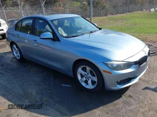 2013 BMW 3 Series 328i with VIN WBA3A5G5XDNP23336, listed as a IAAI auction lot 41895867 with 125,137 mi miles. Bid and sale history available at carsss.com. Image 1.