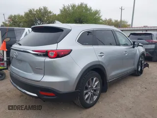 2023 Mazda CX-9 Carbon Edition with VIN JM3TCBDY7P0638506, listed as a IAAI auction lot 41889425 with 60,471 mi miles and . Bid and sale history available at carsss.com. Image 4.