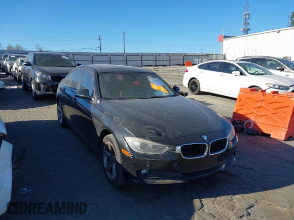 2014 BMW 3 Series 328i with VIN WBA3A5G59ENP31817, listed as a IAAI auction lot 41845296 with 190,437 mi miles. Bid and sale history available at carsss.com. Image 1.