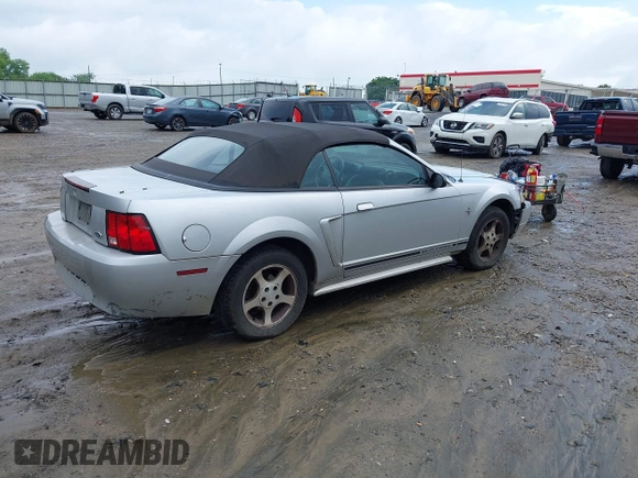2001 Ford Mustang Deluxe z VIN 1FAFP44461F132453, wystawiony jako IAAI lot #42243068 z przebiegiem 183 171 mil mil oraz . Historia ofert i sprzedaży dostępna na DreamBid. Obrazek 4.