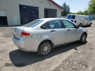 2009 Ford Focus SE z VIN 1FAHP35N99W210276, wystawiony jako Copart lot #59235675 z przebiegiem 143 828 mil mil oraz Czysty tytuł • Clean title. Historia ofert i sprzedaży dostępna na DreamBid. Obrazek 3.