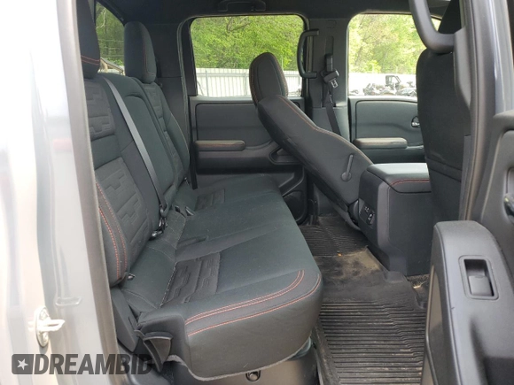 2022 Nissan Frontier Pro-4X z VIN 1N6ED1EK2NN694482, wystawiony jako Copart lot #51804515 z przebiegiem 32 288 mil mil oraz Szkoda całkowita • Salvage title. Historia ofert i sprzedaży dostępna na DreamBid. Obrazek 10.