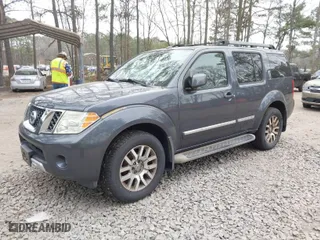 2010 Nissan Pathfinder SE with VIN 5N1AR1NB4AC627788, listed as a IAAI auction lot 41733257 with 130,586 mi miles. Bid and sale history available at carsss.com. Image 2.