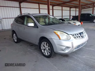 2011 Nissan Rogue SV with VIN JN8AS5MT6BW187507, listed as a IAAI auction lot 42050157 with 124,714 mi miles. Bid and sale history available at carsss.com. Image 1.