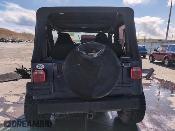 1997 Jeep Wrangler SE z VIN 1J4FY29P1VP441353, wystawiony jako Copart lot #51691545 z przebiegiem Nie podano mil oraz Szkoda całkowita • Salvage title. Historia ofert i sprzedaży dostępna na DreamBid. Obrazek 6.