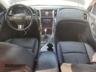2014 Infiniti Q50 Hybrid Premium z VIN JN1AV7AP7EM690200, wystawiony jako Copart lot #57502835 z przebiegiem 144 447 mil mil oraz Nie do naprawy. Historia ofert i sprzedaży dostępna na DreamBid. Obrazek 8.