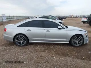 2013 Audi A6 3.0T Prestige with VIN WAUJGAFC8DN015066, listed as a IAAI auction lot 40978422 with 164,992 mi miles. Bid and sale history available at carsss.com. Image 14.