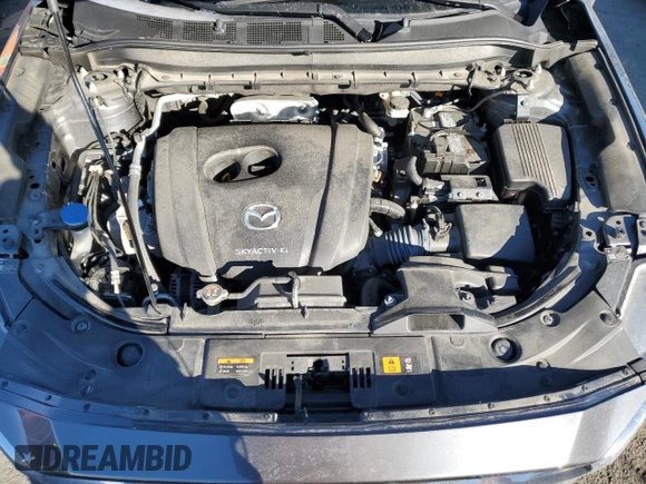 2021 Mazda CX-5 Grand Touring with VIN JM3KFBDM9M0490239, listed as a Copart auction lot 43306975 with 47,010 mi miles and Salvage Title. Bid and sale history available at carsss.com. Image 12.