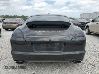 2013 Porsche Panamera с VIN WP0AA2A75DL016661, выставлен на аукционе Copart как лот 48977385 с пробегом 55 914 миль миль и Списание • Salvage title. История ставок и продаж доступна на DreamBid. Изображение 6.