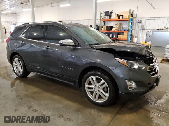 2019 Chevrolet Equinox Premier z VIN 3GNAXYEX6KL195023, wystawiony jako Copart lot #59099375 z przebiegiem 95 586 mil mil oraz Szkoda całkowita • Salvage title. Historia ofert i sprzedaży dostępna na DreamBid. Obrazek 4.