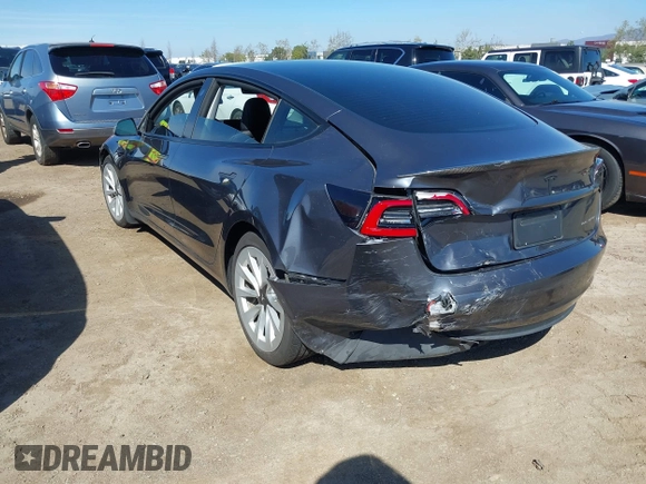 2021 Tesla Model 3 Long Range with VIN 5YJ3E1EB9MF997442, listed as a IAAI auction lot 41759875 with 87,059 mi miles. Bid and sale history available at carsss.com. Image 3.