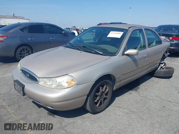 1999 Ford Contour z VIN 3FAFP66L6XM102099, wystawiony jako IAAI lot #42161889 z przebiegiem 100 340 mil mil oraz . Historia ofert i sprzedaży dostępna na DreamBid. Obrazek 17.