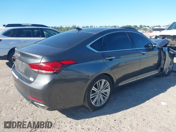 2018 Genesis G80 3.8L z VIN KMHGN4JE7JU226740, wystawiony jako IAAI lot #41821284 z przebiegiem 87 081 mil mil oraz . Historia ofert i sprzedaży dostępna na DreamBid. Obrazek 4.