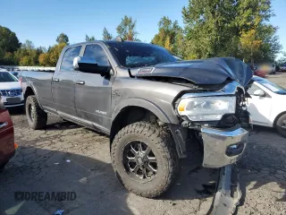 2020 Ram 3500 Laramie with VIN 3C63R3JL3LG240972, listed as a Copart auction lot 77382524 with 99,918 mi miles and Salvage Title. Bid and sale history available at carsss.com. Image 4.