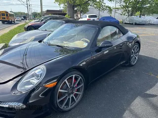 2013 Porsche 911 Carrera S with VIN WP0CB2A97DS154165, listed as a Copart auction lot 56958415 with 99,999 mi miles and Salvage Title. Bid and sale history available at DreamBid. Image 2.