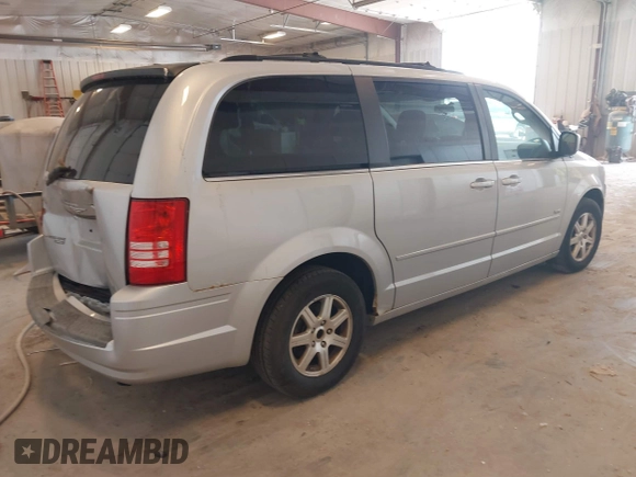 2008 Chrysler Town & Country Touring z VIN 2A8HR54P58R840654, wystawiony jako IAAI lot #42480988 z przebiegiem 132 540 mil mil oraz . Historia ofert i sprzedaży dostępna na DreamBid. Obrazek 4.