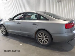 2013 Audi A6 Premium Plus z VIN WAUGGAFC3DN066310, wystawiony jako IAAI lot #42020702 z przebiegiem 195 939 mil mil oraz . Historia ofert i sprzedaży dostępna na DreamBid. Obrazek 15.