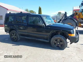 2006 Jeep Commander with VIN 1J8HG48K56C204031, listed as a IAAI auction lot 42034851 with 213,665 mi miles. Bid and sale history available at carsss.com. Image 14.