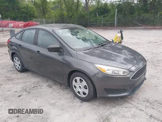 2017 Ford Focus S z VIN 1FADP3E29HL317493, wystawiony jako IAAI lot #42150905 z przebiegiem 12 800 mil mil oraz . Historia ofert i sprzedaży dostępna na DreamBid. Obrazek 1.