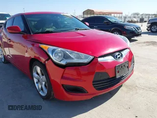 2013 Hyundai Veloster w/Gray Int z VIN KMHTC6AD0DU118150, wystawiony jako IAAI lot #41796309 z przebiegiem 249 384 mil mil oraz . Historia ofert i sprzedaży dostępna na DreamBid. Obrazek 6.