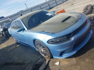 2019 Dodge Charger Scat Pack z VIN 2C3CDXGJ0KH613053, wystawiony jako IAAI lot #41908658 z przebiegiem 85 000 mil mil oraz . Historia ofert i sprzedaży dostępna na DreamBid. Obrazek 1.